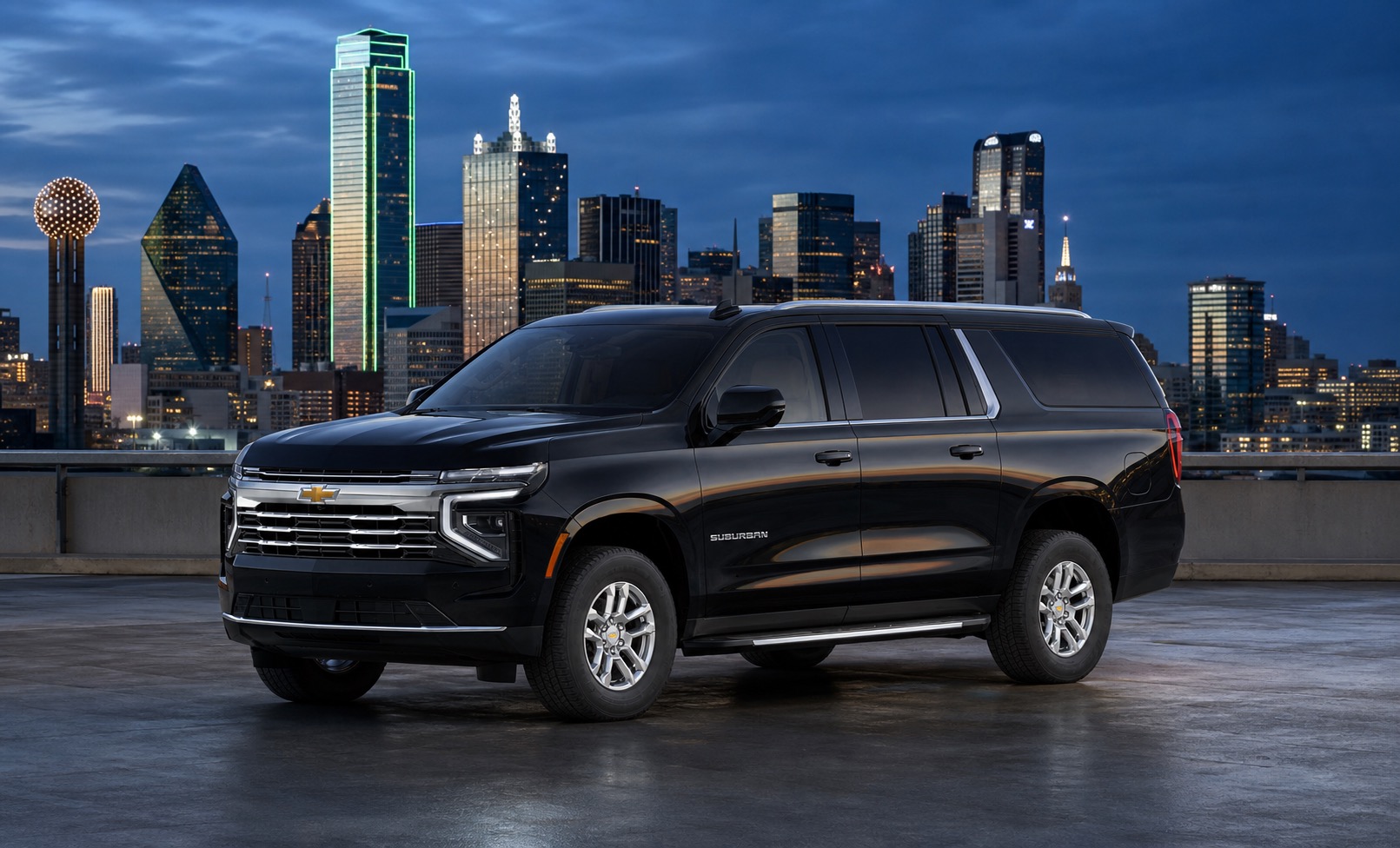 Black Chevrolet Suburban facing left against the Dallas skyline