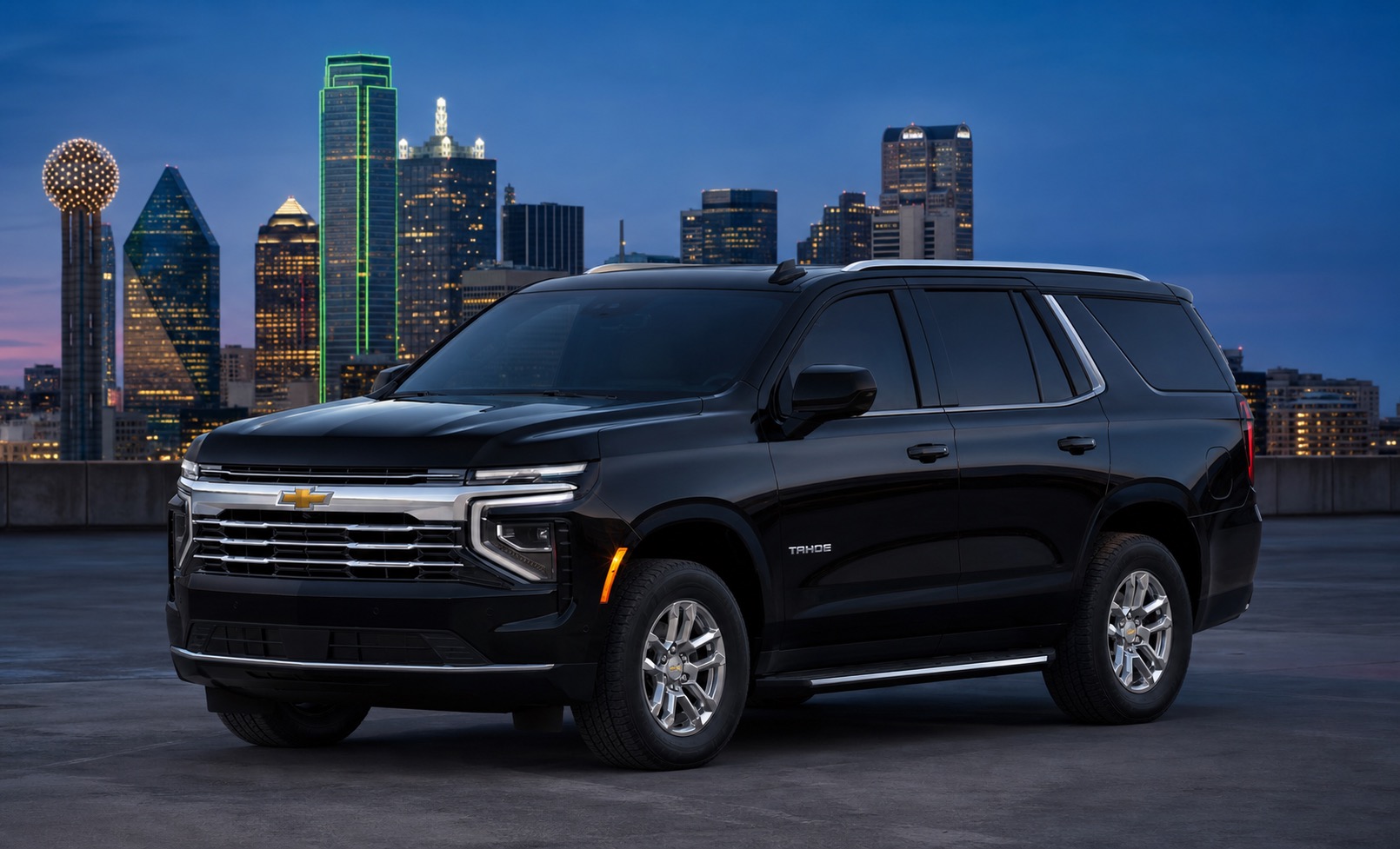 Black Chevrolet Tahoe facing left against the Dallas skyline